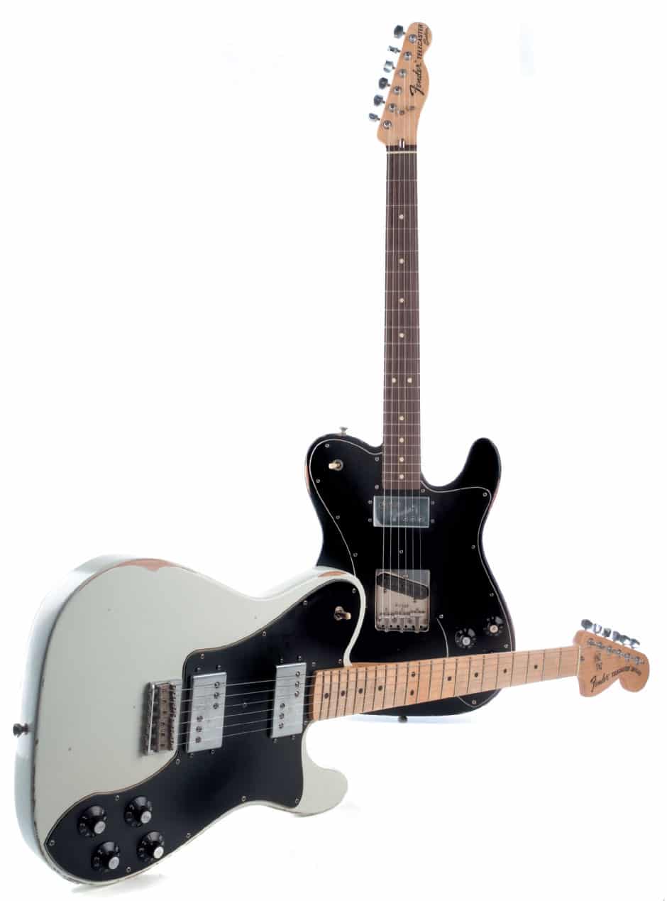 Weiße und schwarze Fender Telecaster, liegend / stehend