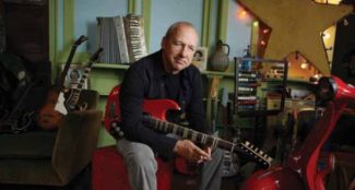 Mark Knopfler mit Gitarre